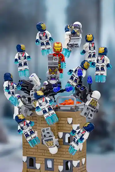 A dynamic LEGO scene featuring Iron Man and multiple Iron Legion suits in white and blue armor flying out of a brick-built tower, with some suits carrying Ultron drones and others engaging in midair battle using repulsor blasts.
