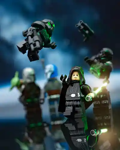LEGO Luke Skywalker in black robes uses the Force to overpower Dark Troopers, with Grogu and other allies watching in the background against a space backdrop.