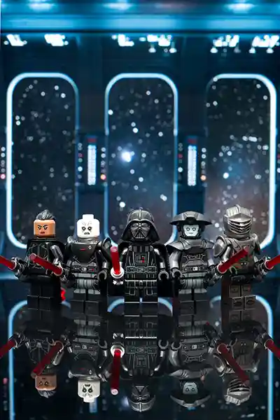 LEGO Darth Vader stands at the center of a group of Inquisitors, all holding red lightsabers, inside a Star Wars Imperial spaceship with a star-filled window backdrop.